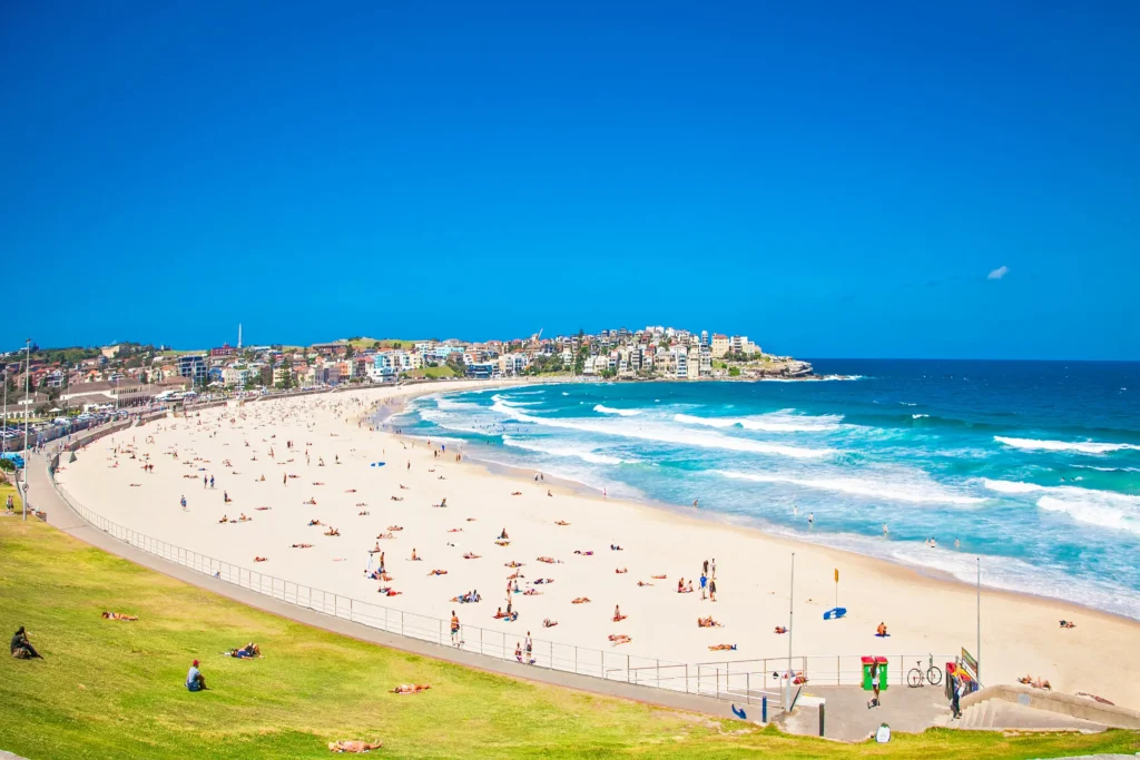 Bondi Beach: Famous for its golden sands, vibrant surf culture, and charming beachside cafes.